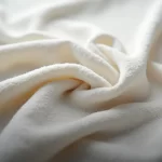 Classificação Fiscal de tecido de malha com plástico estratificado na NCM